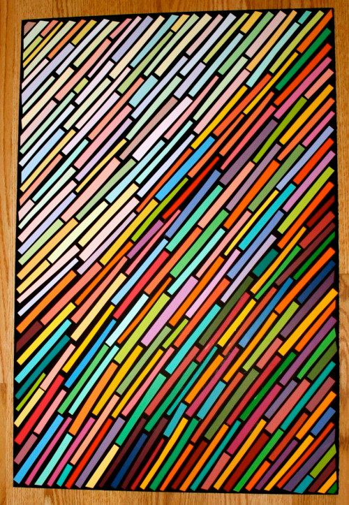 a wooden floor with colorful lines painted on it