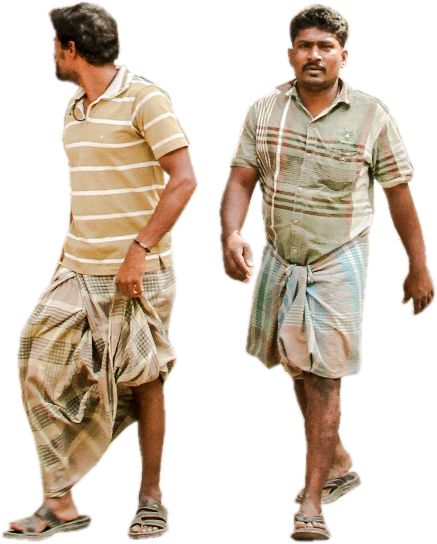 two men are walking down the street in shorts and shirts, one is wearing sandals