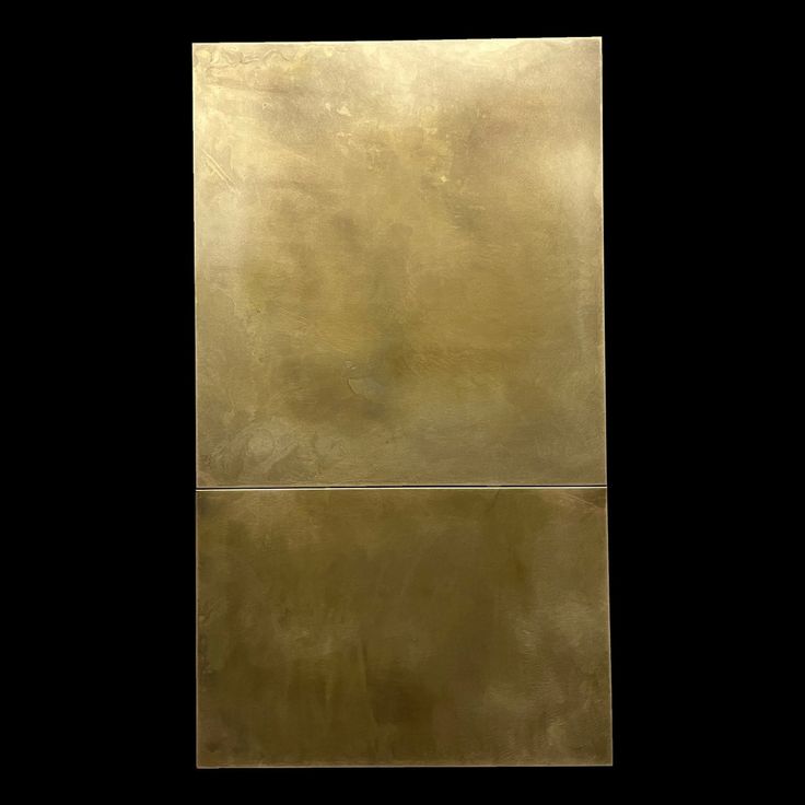 an abstract painting with gold paint and black background