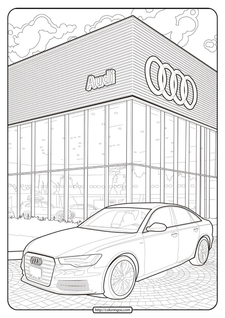 an audi car is parked in front of a building with the word audi on it