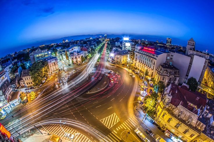 an aerial view of a city at night