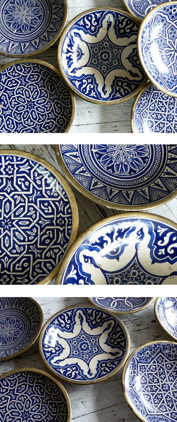 blue and white plates sitting on top of each other