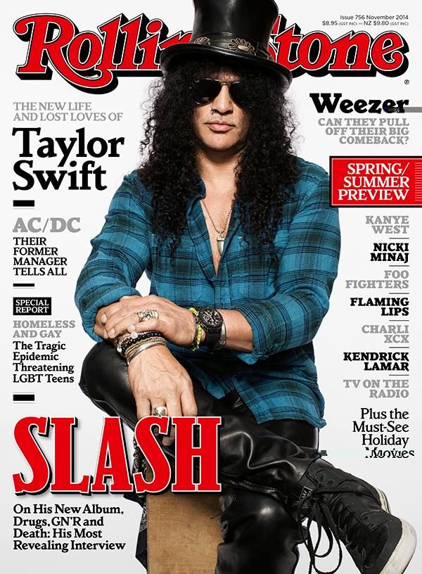 slash on the cover of rolling stone magazine, wearing a black hat and leather pants