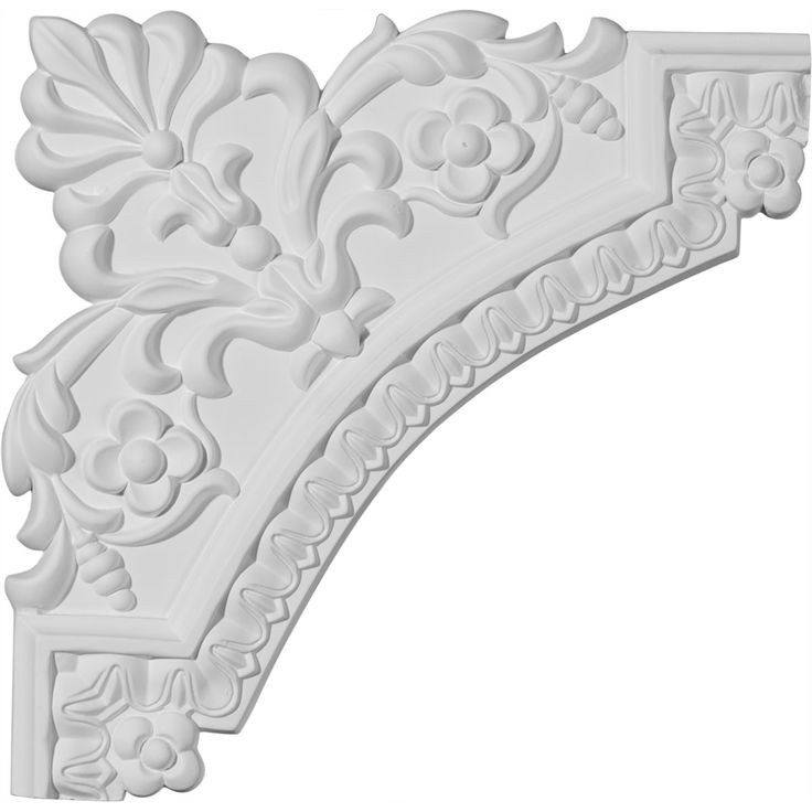 an ornate white plaster moulder on a white background