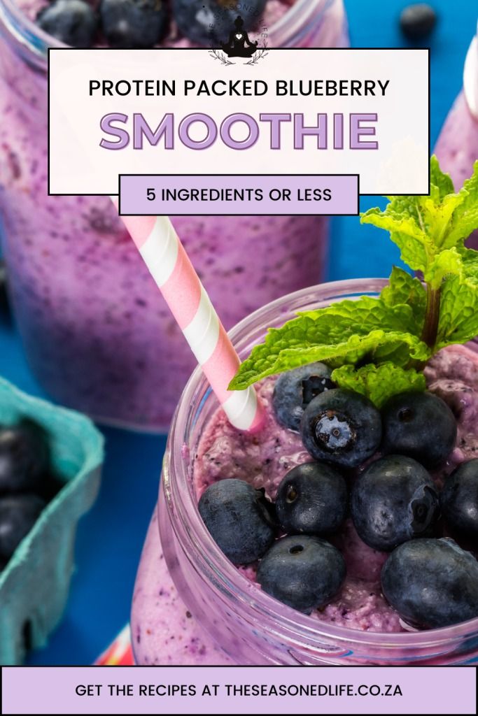 blueberry smoothie in a mason jar with mint sprig