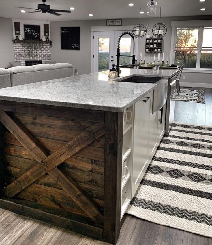 a kitchen island made out of wood and metal