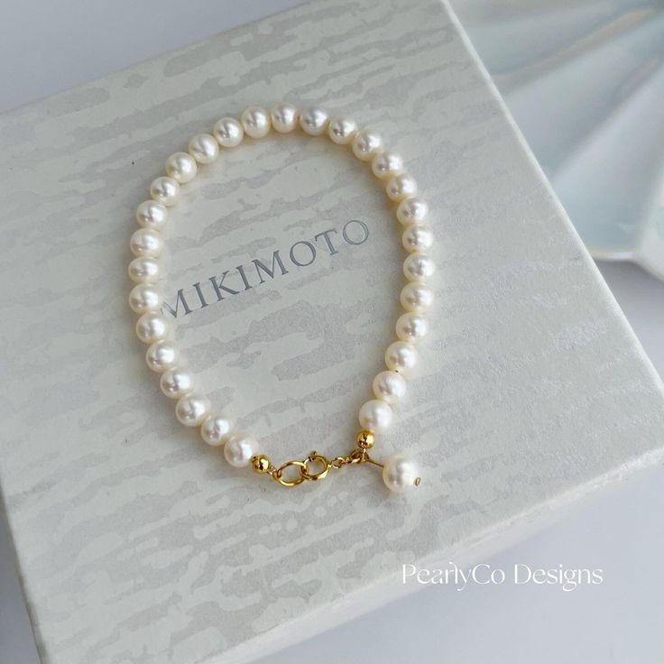 The effortless elegance of this bracelet can be added to your daily outfit and parties, made of 100% natural freshwater pearls. 🤍Natural Freshwater pearls 5-6mm 💛Material: 14K Gold filled (long-time lasting quality). ❤️Adjustable length. 💙Closure: spring ring clasp 🧡Total Length: 18cm (wrists around 14.5-16cm) Or customized.  *Please send me your wrist measurement and also note the bracelet will be a little loose to buckle. Package list : ♥ 1 bracelet; ♥ 1 linen bag; ♥ 1 plastic storage bag; Delicate Pearl Drop Bracelet For Formal Occasions, Delicate Formal Pearl Bracelet, Classic Pearl Bracelet With Pearl Pendant For Weddings, Pearl White Bracelets With Pearl Pendant For Weddings, Dainty Pearl Bracelet For Formal Occasions, Delicate Pearl Pendant Bracelet As Gift, Elegant Single Strand Baroque Pearl Bracelet, Classic Wedding Pearl Bracelet With Pendant, Elegant Baroque Pearl Bracelet For Wedding