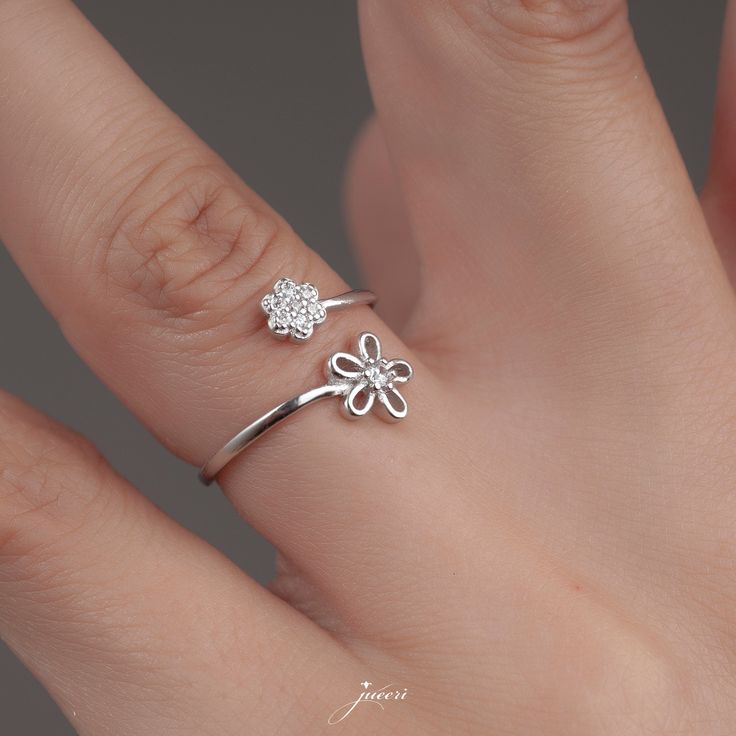 This dainty Original 925 Silver Korean Style Flower Ring would make the perfect birthday gift or a gift for yourself! Minimalist Sakura Leaf Ring is handmade, This Floral Ring would be fantastic for Summer, Handmade Silver Jewellery is crafted with 925 solid sterling silver, Tiny Ring is perfect for everyday wear. PRODUCT DETAILS The material is Solid 925 Sterling Silver. 14K Gold and rose gold are plated over solid 925 sterling silver. ❤ The Ring comes in a special gift box All jewelry of LeianArt is hand-made. 🎁 All Your LeianArt jewelers are nicely packaged and ready to gift in an elegant box. Ready for gift-giving. ️Please use the add gift message option if you would like to leave a gift message along with your order. 💓 100% Original 925K Sterling Silver. 🙊Hassle-free Returns and Mo Elegant Adjustable Flower Ring For Mother's Day, Silver Flower Ring For Mother's Day, Flower Shaped Ring For Mother's Day Anniversary, Flower-shaped Ring For Mother's Day Anniversary, Flower Shaped Ring For Anniversary And Mother's Day, Adjustable Flower Ring Fine Jewelry, Flower Shaped Anniversary Ring For Mother's Day, Sterling Silver Flower Ring Gift, Silver Birth Flower Ring For Anniversary