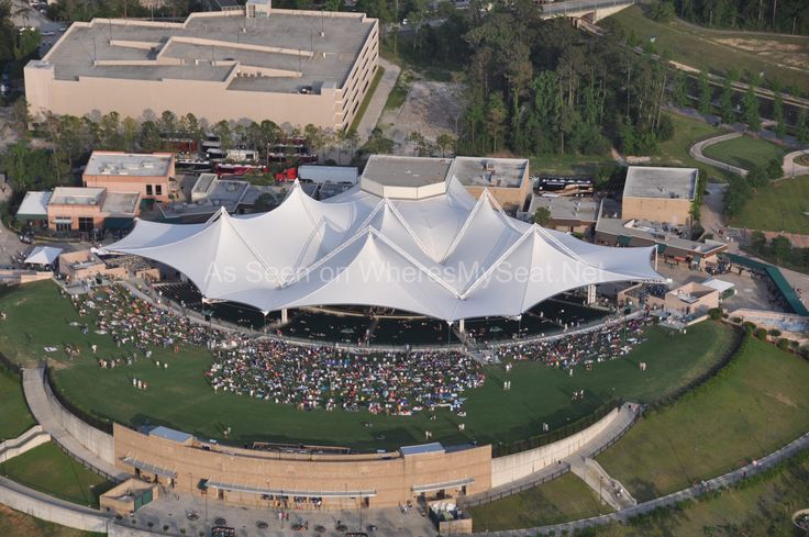 an aerial view of a large white tent