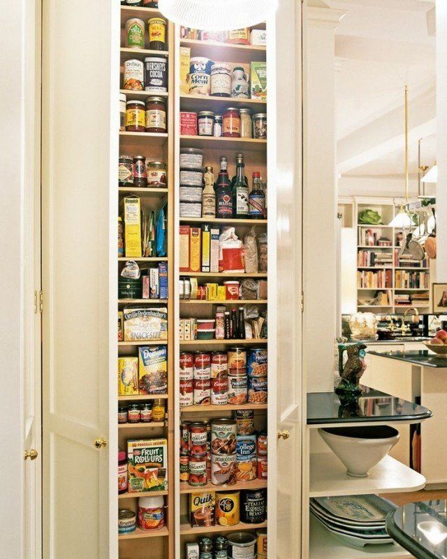 an open pantry with lots of food in it