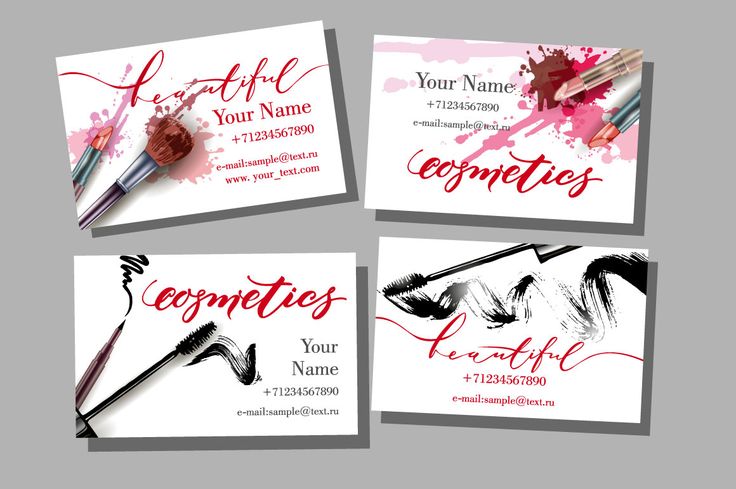 four business cards with watercolor paint and brushes