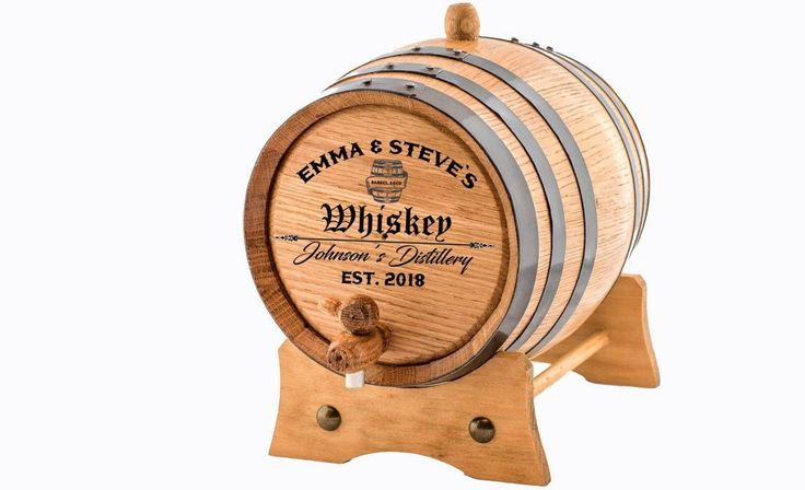 a wooden barrel with the name beer engraved on it