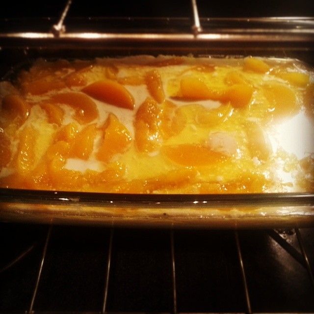 an uncooked casserole is in the oven ready to be baked and eaten