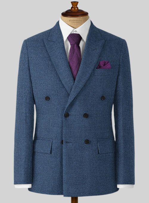 The Rope Weave Persian Blue Tweed Suit is the smartest dress that most men will need outside professional offices. Crafted from wool, the suit is beautifully tailored for timeless appearance so that nothing can knock the blue suit in fine tweed. Wear it with a crisp white shirt and brown derby shoes for a relaxed yet sophisticated look. 
 
 Look Includes  Rope Weave Persian Blue Tweed Fabric  Double Breasted Jacket Style  Peak Lapel  Horn Royal Black Buttons  Single Vent  Three Cuff Buttons  Two Blue Tweed Jacket, Brown Derby, Rope Weave, Smart Dress, Blue Tweed, Persian Blue, Tweed Suits, Crisp White Shirt, Tweed Fabric