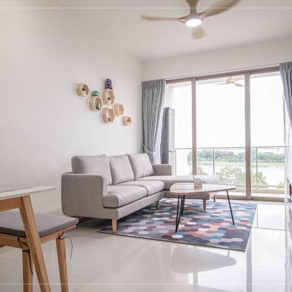 a living room filled with furniture and a flat screen tv