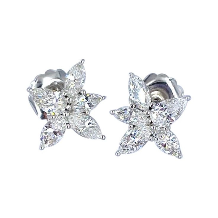 These glamorous earrings by J. Birnbach are a timeless style that adds elegance and sparkle to any ensemble. Perfect for a black tie affair or for a bride, pear shape and marquise diamonds create a lively starburst design. Crafted in 18K white gold, the total diamond weight is 3.39 carats. They are a post earring with a large back for comfortable wear. Marquise Diamond Earrings, Glamorous Earrings, Starburst Design, Black Tie Affair, Marquise Diamond, Pear Shape, Jewelry Earrings Studs, Black Tie, Pear Shaped