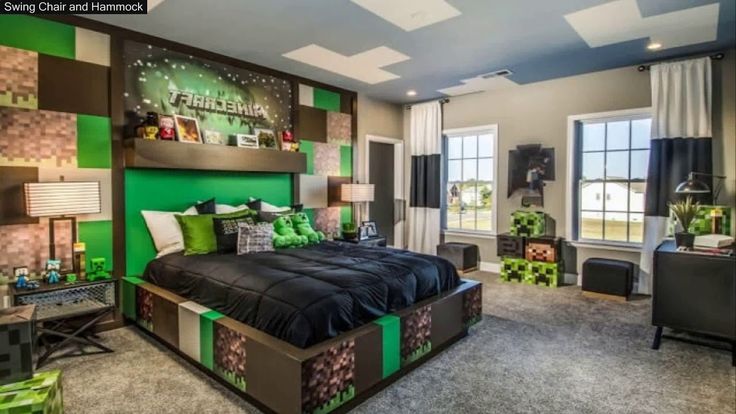 a bedroom decorated in green and black with lots of decor on the walls, windows, and bed