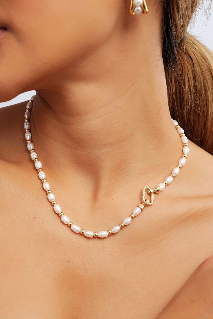 Picture yourself adorned in the delicate pearls of this beaded pearl necklace, exuding effortless charm and sophistication. Ideal for any occasion, from brunch with friends to a romantic evening out, these pearls add a touch of timeless beauty to your ensemble. Elegant Beaded Baroque Pearl Necklace, Chic White Chain Necklace With Pearl Charm, Party Pearl Chain Necklace With Pearl Charm, Pearl Chain Necklace With Pearl Charm For Parties, Party Pearl Charm Chain Necklace, Chic Pearl Necklace For Wedding, Chic Pearl White Necklace For Wedding, Elegant Pearl White Beaded Chain Necklace, Chic Beaded Pearl Necklace