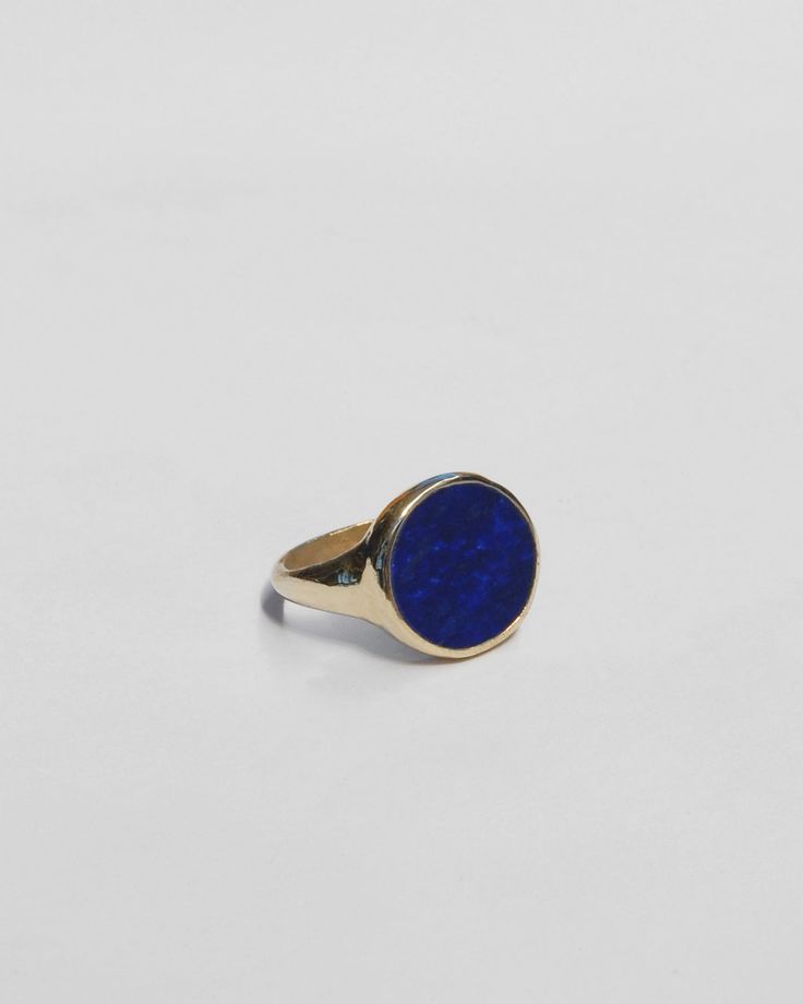 Availability: MADE TO ORDER, ships in 3-4 weeks. All orders placed after December 5th will ship in January 2025. A clean, modern stone signet ring, set with a custom cut disc of lapis lazuli. Heavy bezel setting was hand carved in wax and then cast in brass or sterling silver, stone measures 5/8" in diameter Currently available in sizes 4-12. (Please contact us for custom sizing) Lapis Lazuli Jewelry, Wax Carving, Sports Jewelry, Polki Necklace, Lapis Lazuli Ring, Clean Modern, Signet Ring, Bezel Setting, Necklace Designs