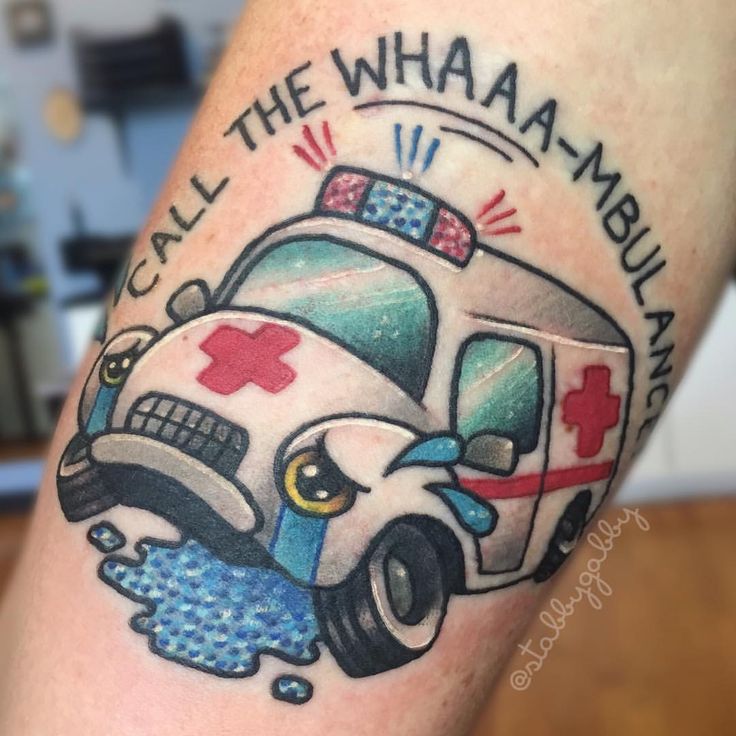 a tattoo with an ambulance on it