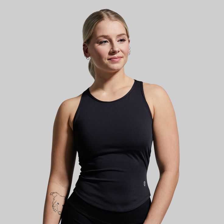 Just like workouts, not all tanks are built the same. When the burn starts setting in, you need workout apparel that’s built to keep you pushing ‘til the end. Made from a stretchy, moisture-wicking fabric with a flattering fit for athletic builds, the Pina is the kind of tank you can rely on to get you through the toughest days at the gym. Black Tank Top Women, Athletic Build, Sweaty Workouts, Tough Day, Black Tank Top, At The Gym, Back Design, Black Tank, Moisture Wicking Fabric