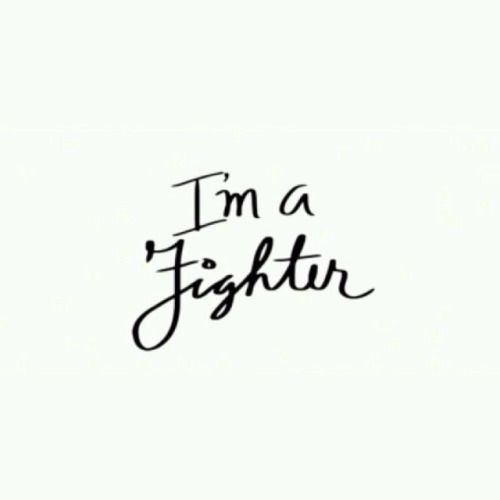 the words i'm a fighter written in black ink