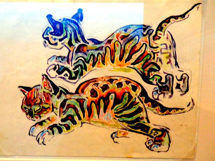 a drawing of two cats with different colors