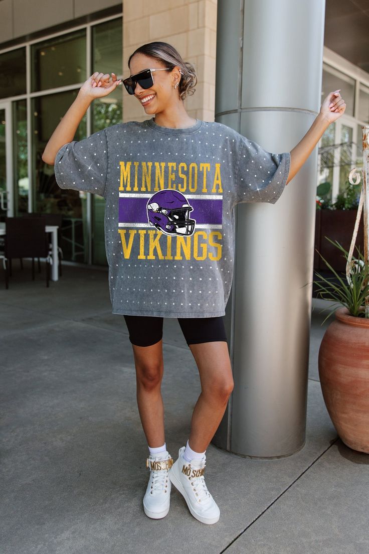 Make a statement in any crowd with our Minnesota Vikings oversized fit, all-over mini rhinestone short sleeve tee featuring a ribbed neckline. Embrace the sparkle while staying comfortable—perfect for every dedicated fan. Mn Vikings Outfit Woman, Vikings Outfit, Mn Vikings, Viking Shirt, Sweater Tops, Long Sweater, Minnesota Vikings, Ribbed Neckline, Long Sweaters