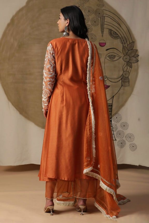 Burnt orange angarkha with dori and sequins embroidery on sleeves and cori shells on neckline. Paired with a plain pant and an embroidered dupatta with fringe border. - Aza Fashions Angrakha Suit, Dori Work, Plain Pants, Organza Dupatta, Sequins Embroidery, Ankle Length Pants, Kurta Set, Suit Set, Pants Pattern