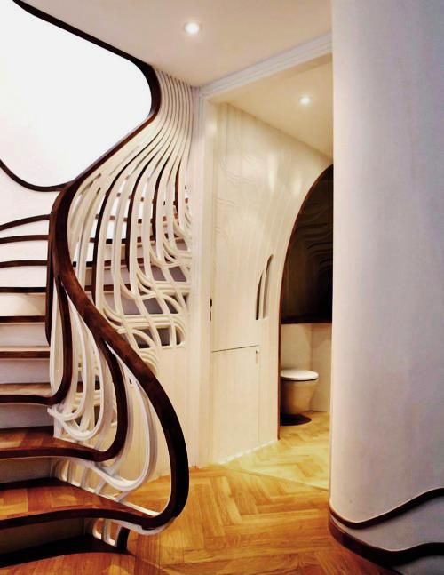 there is a spiral staircase in the house that has been designed to look like it's going up