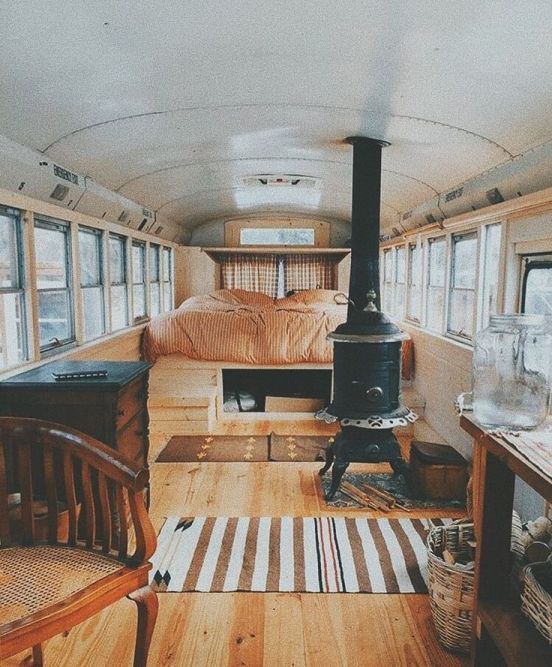 the interior of an old bus with wood floors and windows on both sides is shown