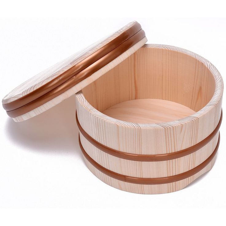 two wooden containers with lids on white background