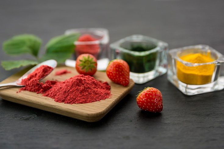 there are three different types of powders on the table next to each other, including strawberries and orange juice