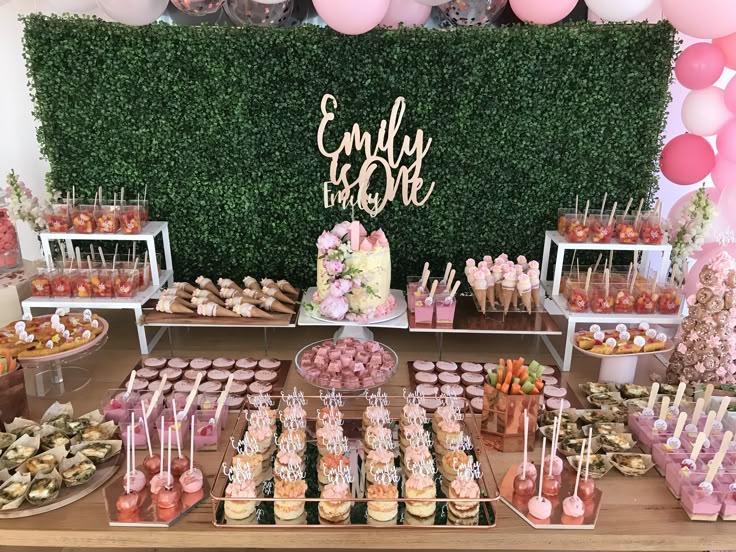 a table filled with lots of desserts and candy