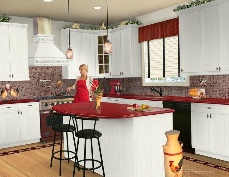 a woman standing at the center of a kitchen island