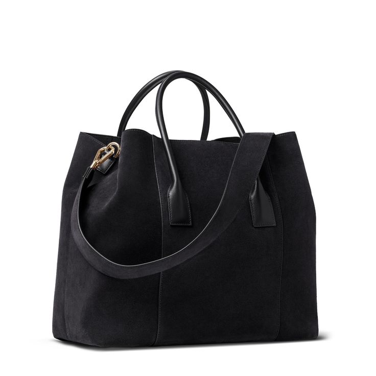 Practical and stylish, this mini weekender bag is ideal for an overnight getaway or for times when a roomy handbag is required on a busy day. Expertly made to the highest standards in Florence, Italy, it has shoulder straps or a longer detachable strap can be used for ease of transport. Suede Inside pocket Dimensions: 13.6"l x 6.7"w x 11.4"h Comes in a protective dust bag Made in Italy Care instructions: Only clean with a dry brush or dry cloth | AERIN Suede Mini Weekender size 13.6"l x 6.7"w x Luxury Satchel Tote For On-the-go, Chic Rectangular Weekender Bag For On-the-go, Elegant Everyday Shoulder Duffle Bag, Elegant Rectangular Duffle Bag For Everyday Use, Luxury Large Capacity Briefcase For On-the-go, Elegant Rectangular Everyday Duffle Bag, Elegant Everyday Duffle Bag, Elegant Everyday Rectangular Duffle Bag, Modern Rectangular Weekender Bag With Leather Handles