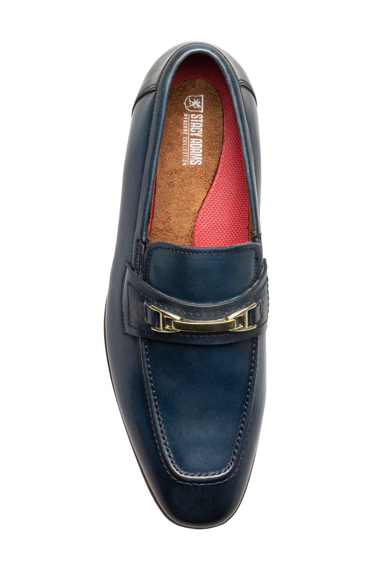 Sleek bit hardware punctuates the upper of this smooth leather loafer that's a sophisticated way to complete your ensemble. Removable, cushioned insole with arch support Leather upper/textile lining/rubber sole Imported Formal Slip-on Leather Shoes With Ortholite Insole, Formal Slip-on Loafers With Ortholite Insole, Formal Moccasins With Ortholite Insole, Leather Loafers With Ortholite Insole For Office, Formal Blue Moccasins With Removable Insole, Blue Classic Boat Shoes For Formal Occasions, Formal Slip-on Moccasins With Ortholite Insole, Modern Formal Slip-ons With Ortholite Insole, Elegant Moc Toe Boat Shoes For Business