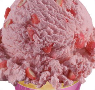 a scoop of strawberry ice cream in a pink cup