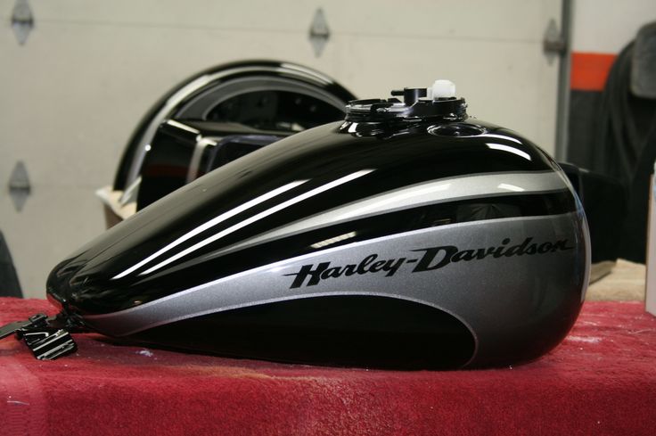 a harley davidson motorcycle helmet sitting on top of a table