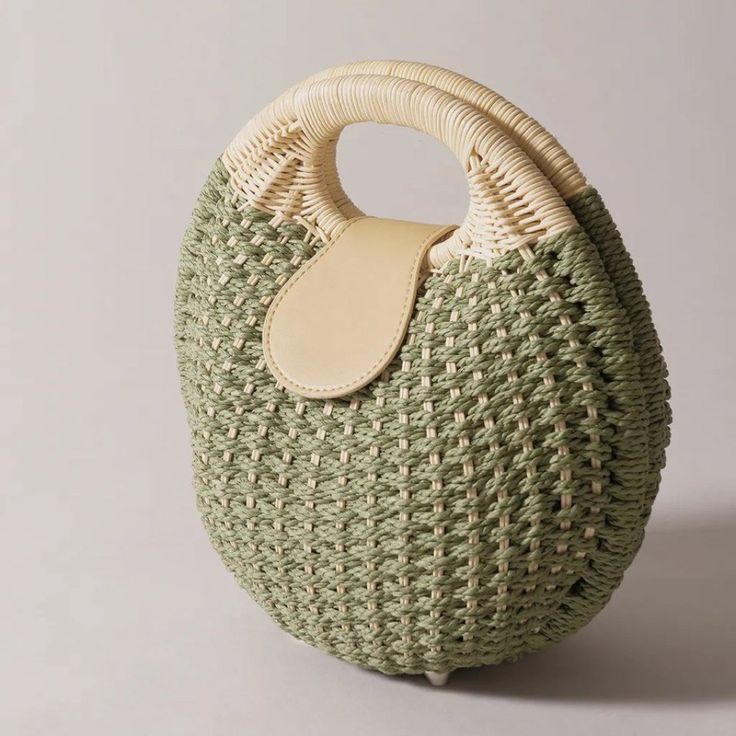 Handmade Bamboo Round Bag (Green) Designer Original Elevate Your Style With This Stunning Handmade Bamboo Round Bag, Designed For Those Who Appreciate Unique, Eco-Friendly Fashion. This One-Of-A-Kind Accessory Combines Natural Beauty With Functional Design, Making It The Perfect Statement Piece For Any Occasion. Features: Distinctive Round Design: A Modern Twist On Classic Shapes, This Bag Adds A Touch Of Sophistication To Any Outfit. Premium Bamboo Material: Crafted From High-Quality Bamboo, Th Chic Green Bag With Round Handle, Chic Green Shoulder Bag With Round Handle, Everyday Green Shoulder Bag With Round Handle, Green Shoulder Bag With Round Handle For Everyday, Trendy Green Handmade Straw Bag, Chic Green Shoulder Bag With Braided Handles, Green Pouch Bucket Bag For Summer, Green Woven Shoulder Bucket Bag, Green Summer Bag With Detachable Handle