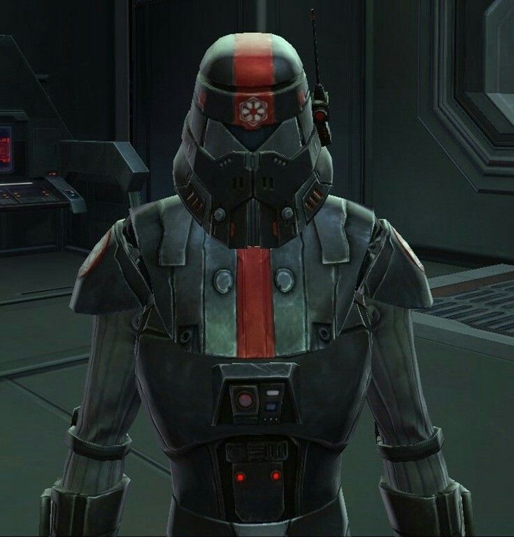 a star wars sith trooper standing in front of a computer screen with the lights on