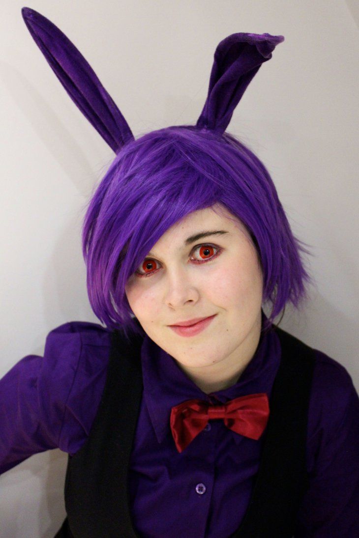 a person with purple hair and bunny ears