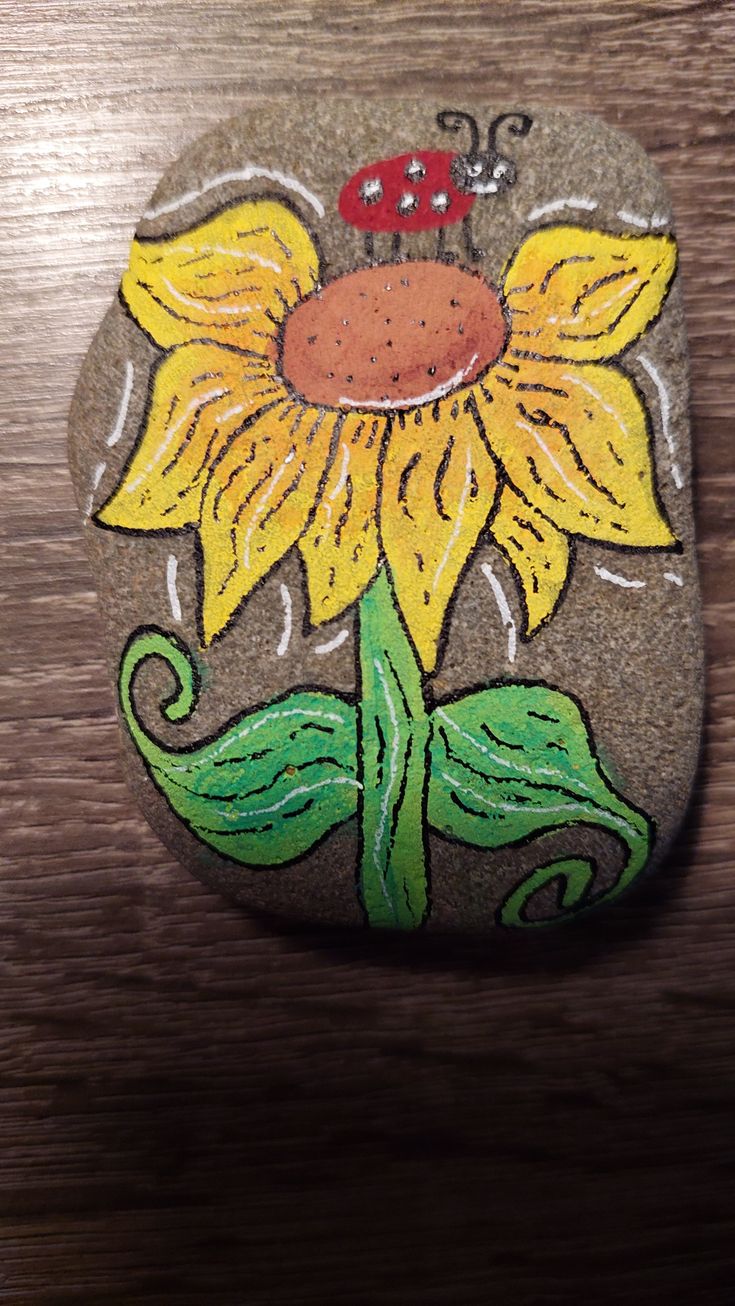 Flower happy stone in 2024 | Rock painting patterns, Rock painting art ...