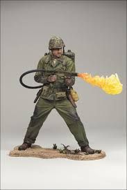 a statue of a soldier holding a fire extinguisher in his right hand