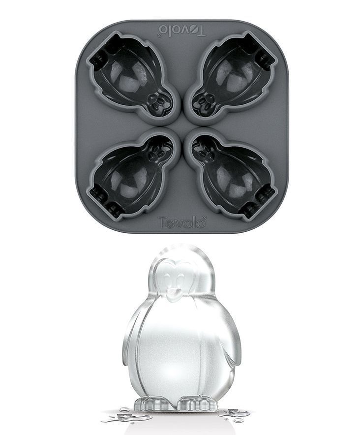 an owl shaped ice tray with four pieces in it and the top one is empty