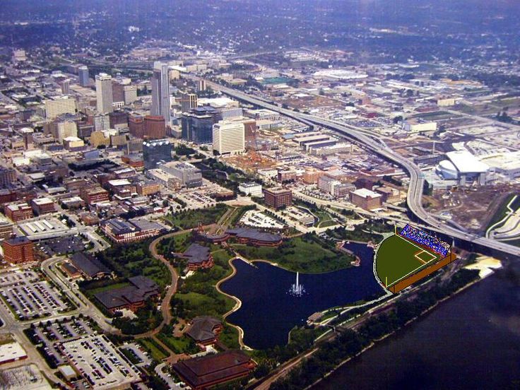 an aerial view of a city with lots of water