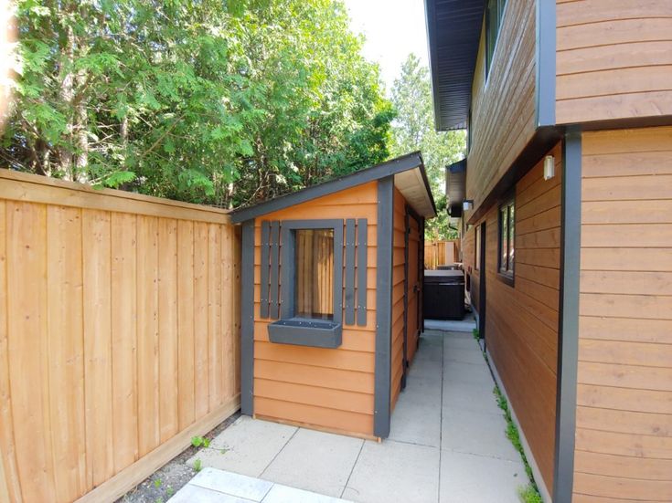 an outside view of a wooden fenced in area