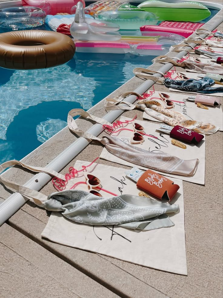 an inflatable swimming pool with several items laid out on it