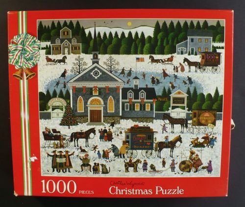 a puzzle box with a christmas village scene on it's front and the words, 100 pieces