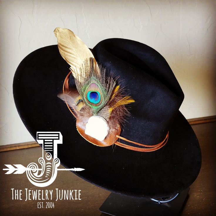 If you’re looking for the perfect accessory to complement your favorite boho style, look no further. This Boho-Style Western Felt Hat w/ Natural Feather & Turquoise Hat Accent by The Jewelry Junkie is absolutely everything that you need. Not only is it easy to incorporate into any and all outfits, but the genuine leather and natural feathers of the band immediately elevate whatever it is you’re wearing. One Size Hat with adjustable inner hat liner (see last photos) The same primary feathers will Bohemian Adjustable Felt Hat For Kentucky Derby, Bohemian Adjustable Hat For Kentucky Derby, Adjustable Bohemian Felt Hat For Kentucky Derby, Turquoise Hat For Kentucky Derby Festival, Turquoise Hats For Kentucky Derby And Festivals, Turquoise Bohemian Hat For Kentucky Derby, Black Bohemian Felt Hat For Western-themed Events, Turquoise Hat For Festival And Kentucky Derby, Turquoise Bohemian Hat For Western-themed Events